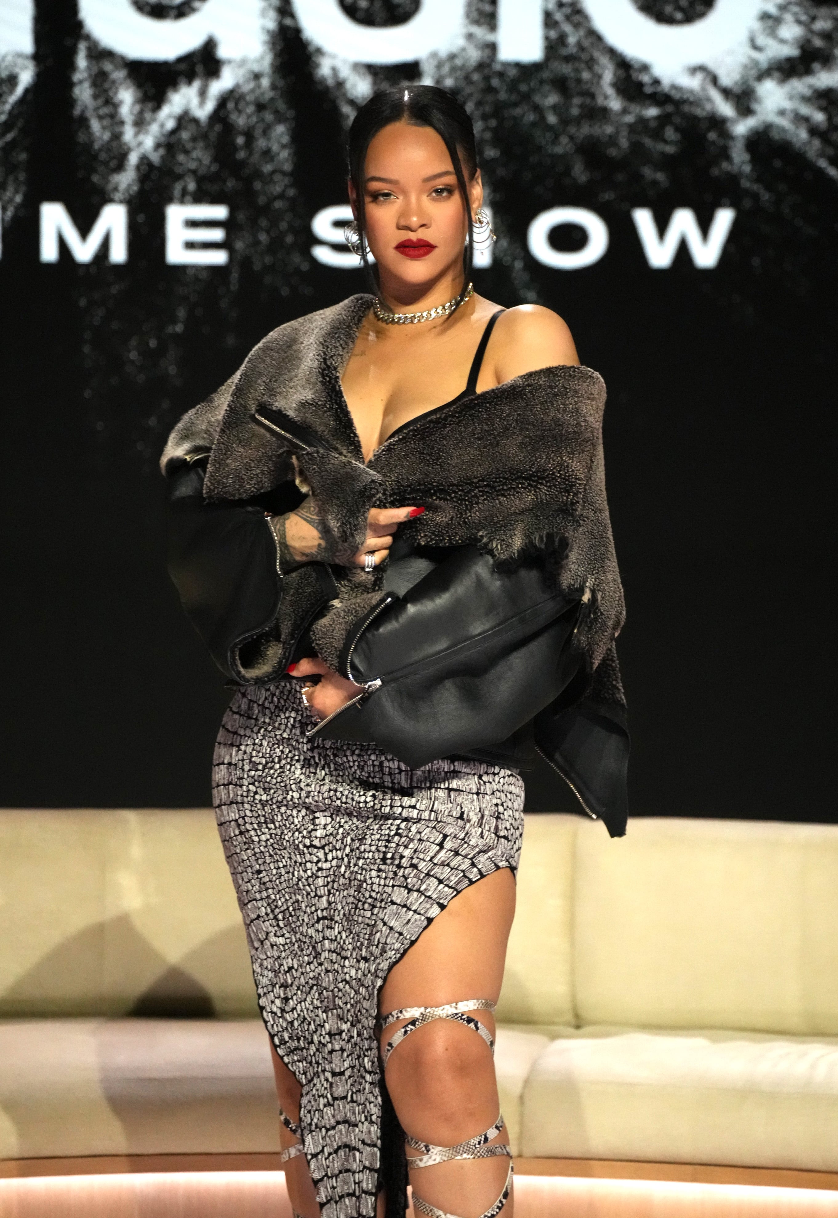 Rihanna's Plunging Top & High Slit Skirt Super Bowl Press Conference –  Hollywood Life
