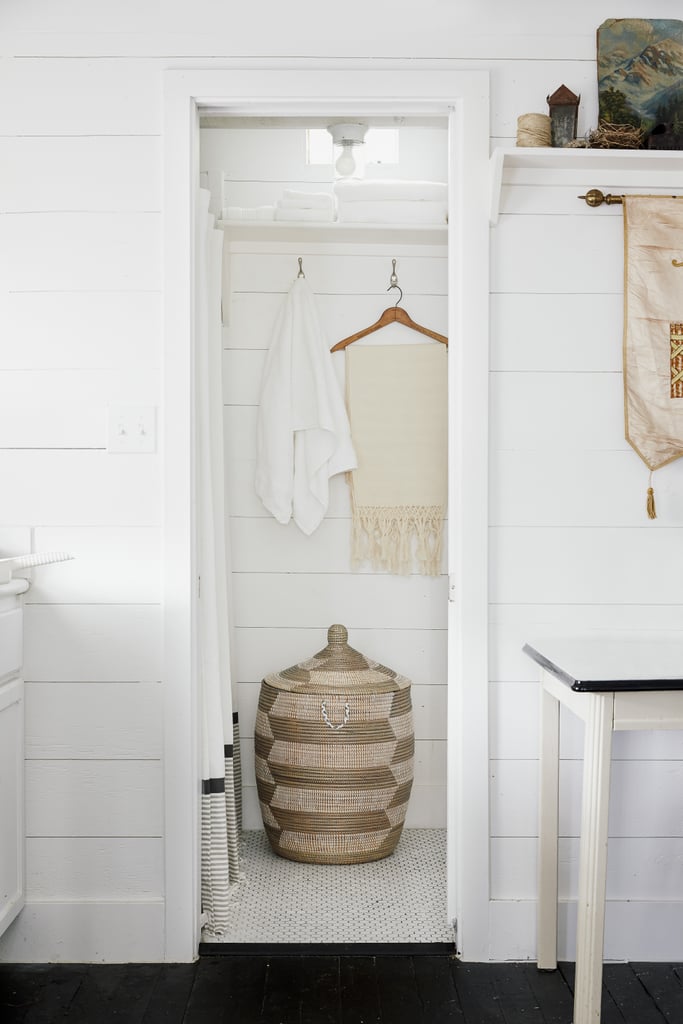 The shower was widened to feel extraluxe, and it even includes a rain showerhead.  
Source: Cody Ulrich via Homepolish