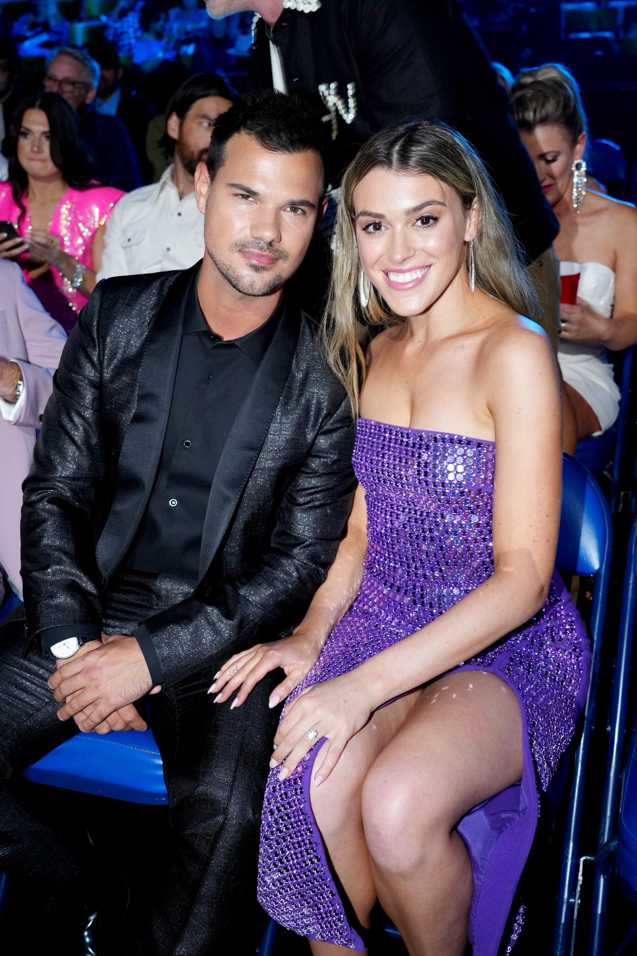 NASHVILLE, TENNESSEE - APRIL 11: (L-R) Taylor Lautner and Taylor Dome attend the 2022 CMT Music Awards at Nashville Municipal Auditorium on April 11, 2022 in Nashville, Tennessee. (Photo by Jeff Kravitz/Getty Images for CMT)
