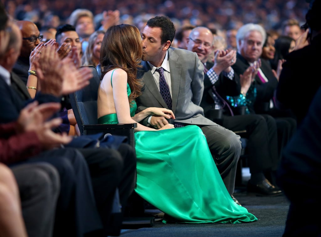 Adam Sandler and his wife, Jackie, snuck a kiss in the audience.