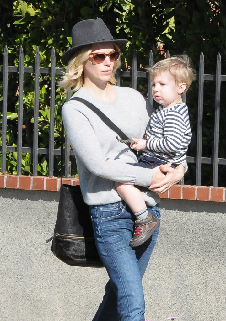 January Jones held her son, Xander, while out and about in LA on Saturday.