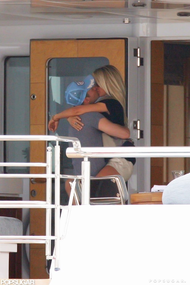 Ryan Seacrest and Julianne Hough embraced on a yacht off the coast of Italy in July 2010.