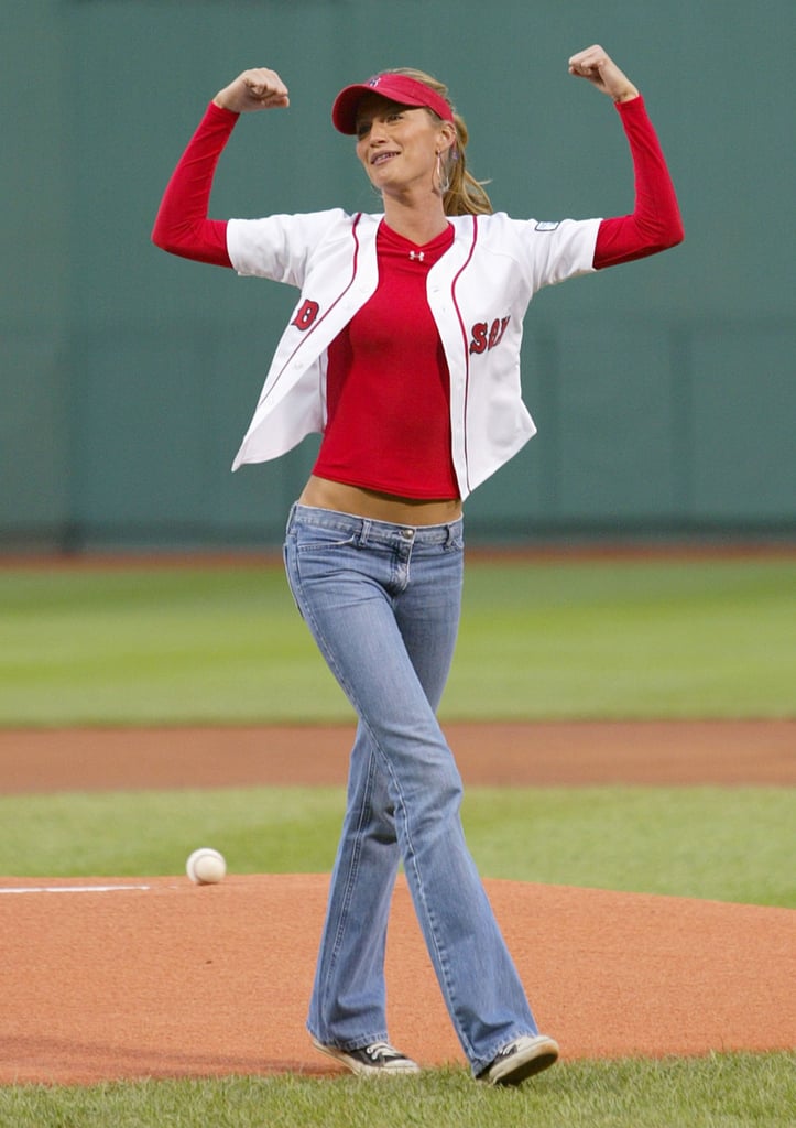 Gisele Bündchen showed her strength after she threw out the first pitch at the Boston Red Sox game in May 2004.