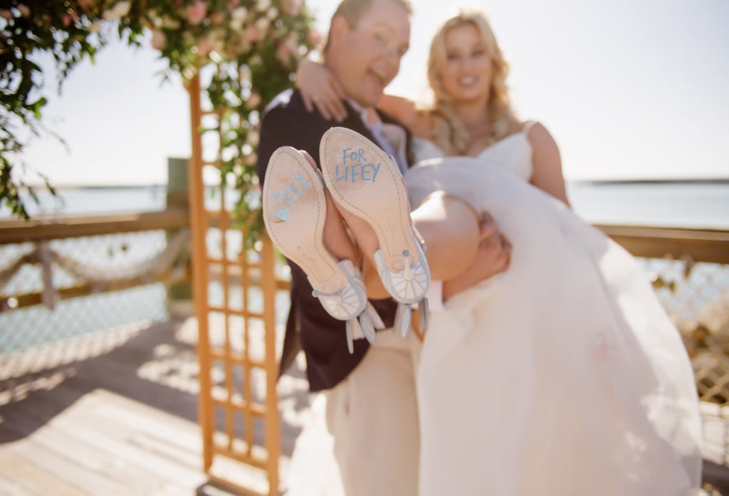For the wedding ceremony, the bride wore (light blue!) patent leather heels that said "Wifey For Lifey" on the soles.