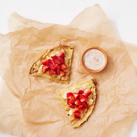 Socca With Mashed Banana, Sliced Strawberries, and Tahini