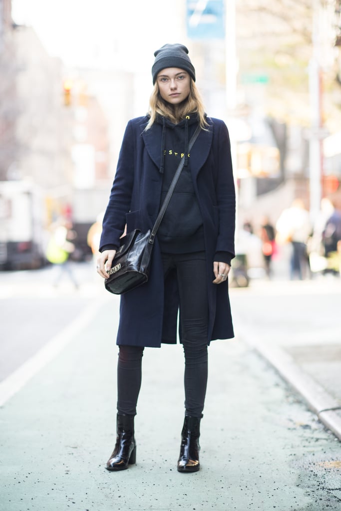 A hoodie and a beanie lend a sportier, '90s-girl effect to this winter style. 
Source: Le 21ème | Adam Katz Sinding