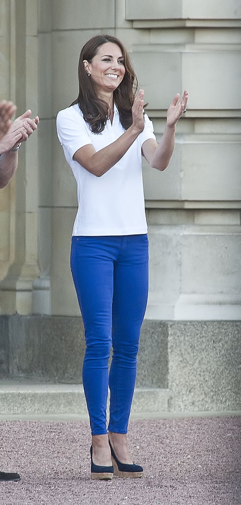 Kate wore royal-blue Zara jeans with cork wedges darker in shade, adding a touch of brightness with a white top.