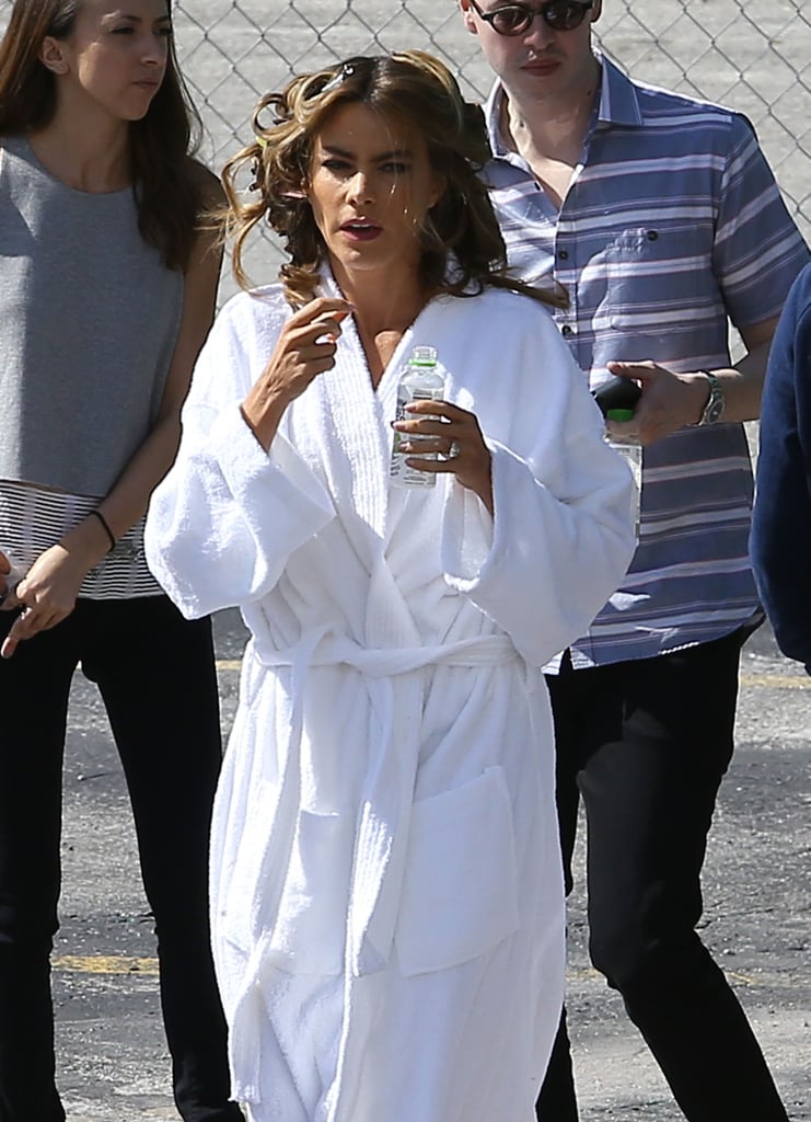 Sofia Vergara had curlers in her hair while preparing to film a commercial in Miami on Sunday.