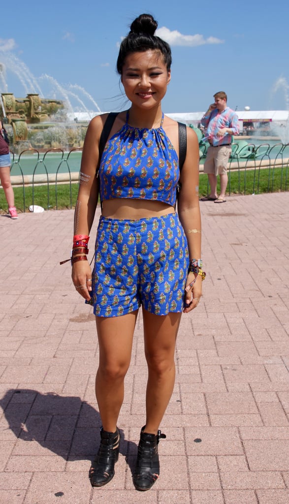 A girlie matching shorts set got the downtown treatment thanks to a black leather backpack and boots.