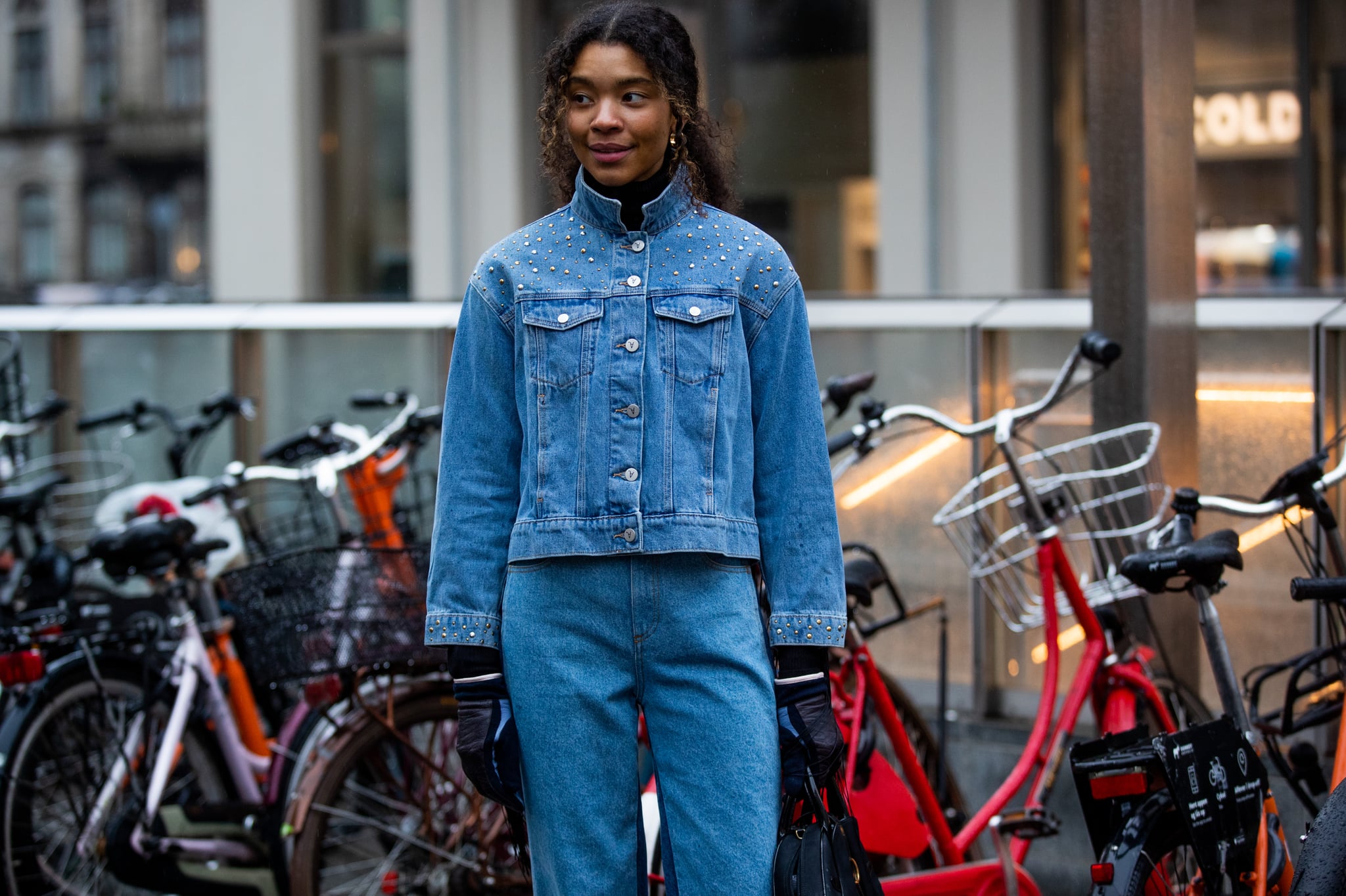 COPENHAGEN, DENMARK - FEBRUARY 01: Sara Flaaen Licius wearing denim jacket & jeans seen outside Lovechild 1979 during Copenhagen Fashion Week Autumn/Winter 2022 on February 01, 2022 in Copenhagen, Denmark. (Photo by Christian Vierig/Getty Images)