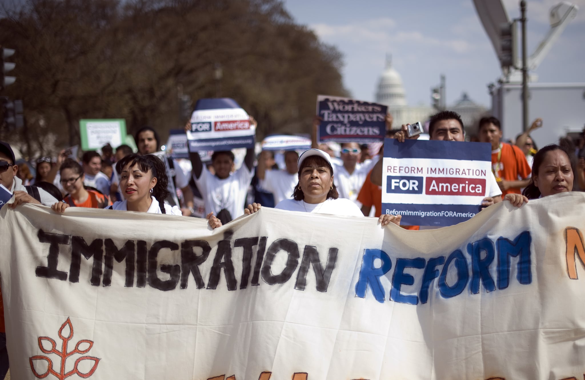UNITED STATES - MARCH 21:  Crowds where estimated at or vary near 100,000 people on the National Mall to march for immigration reform at the same time the House health care vote was happening in the U.S. Capitol. The area was buzzing with protesters. March 21, 2010.  (Photo By Douglas Graham/Roll Call/Getty Images)