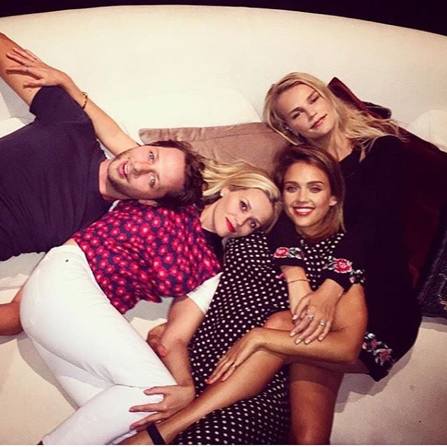 "The snuggle is real," Reese wrote alongside this photo with Jessica Alba.