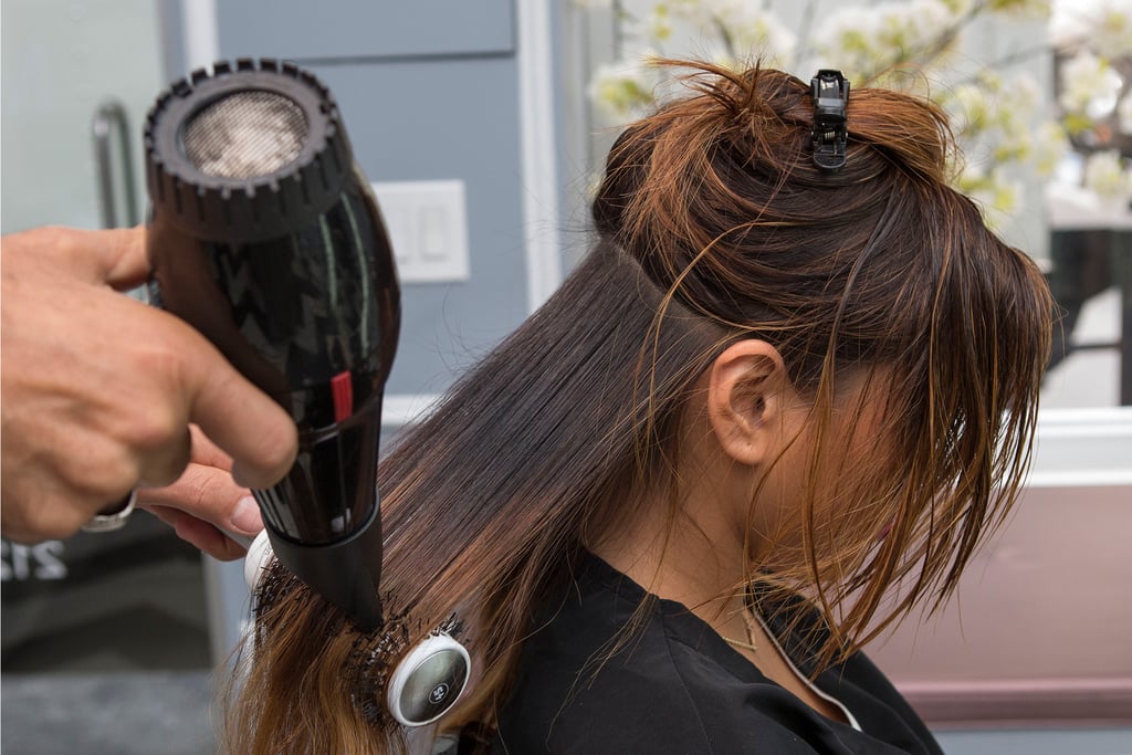 Use a round brush to straighten your strands. Sideswept Waves HowTo