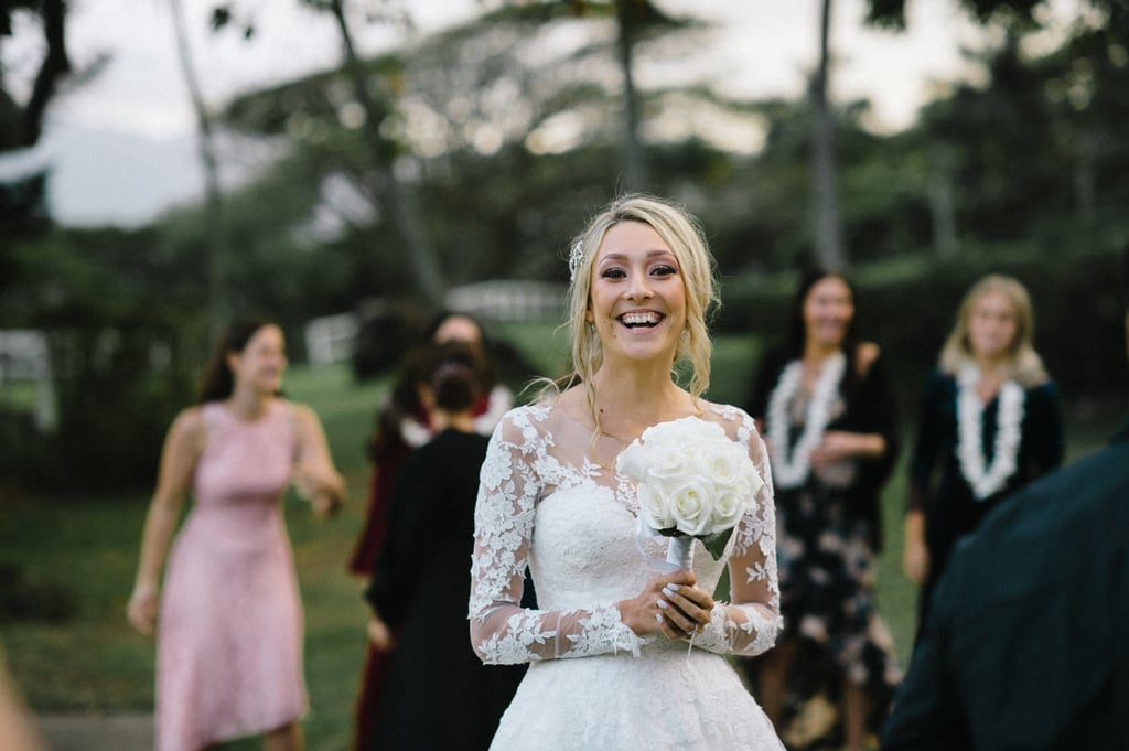 Couple Takes Wedding Photos in Bouncy Castle