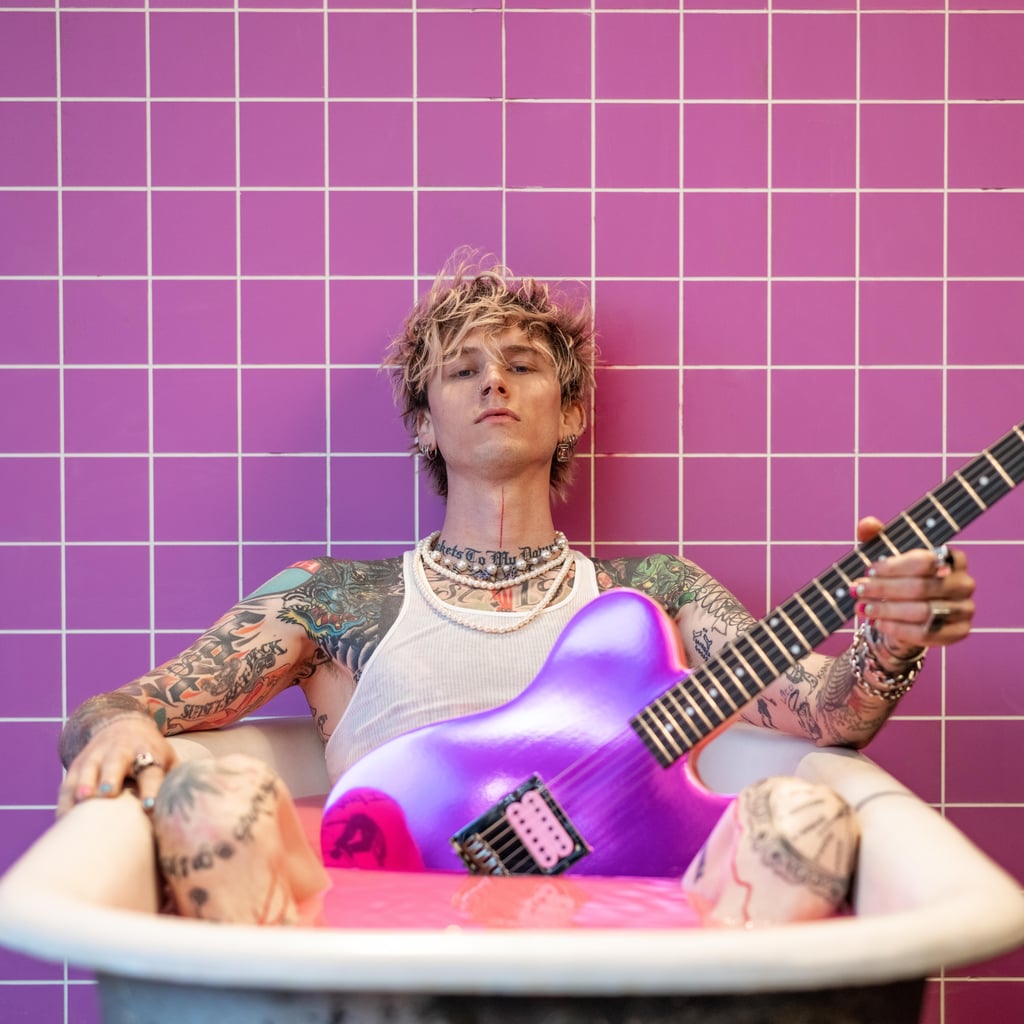 pink electric guitar mgk