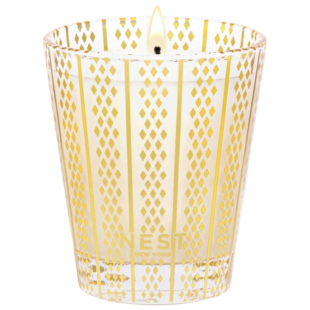 Nest New York Holiday Classic Candle ($46)
"Candles are always a great gift idea (I say this as the proud owner of a candle cabinet). The Nest New York Holiday Classic Candle is the ultimate stocking stuffer and white elephant present. With notes of pomegranate, pine, and cloves, it's a great holiday scent without being too Christmas-y, and the glass jar it comes in is so cute that they'll want to reuse it." — Jessica Harrington, beauty section lead
