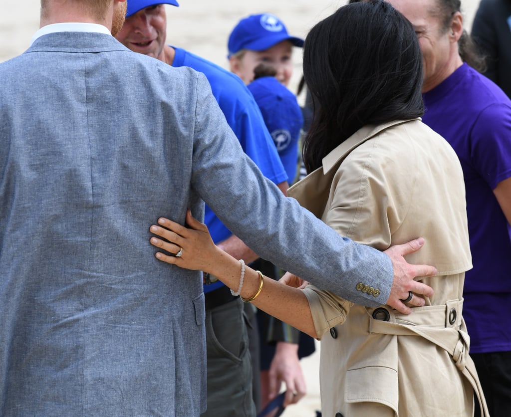 Meghan Markle and Prince Harry Hands on Each Other's Backs