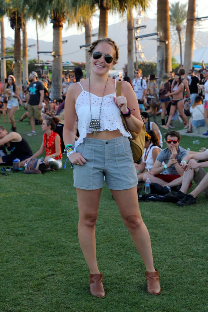 Grace Hitchcock, Senior Audience Development Associate at Popsugar, wore a white ruffled cami tank, high-waisted shorts, leather ankle boots, and a chunky pendant necklace.