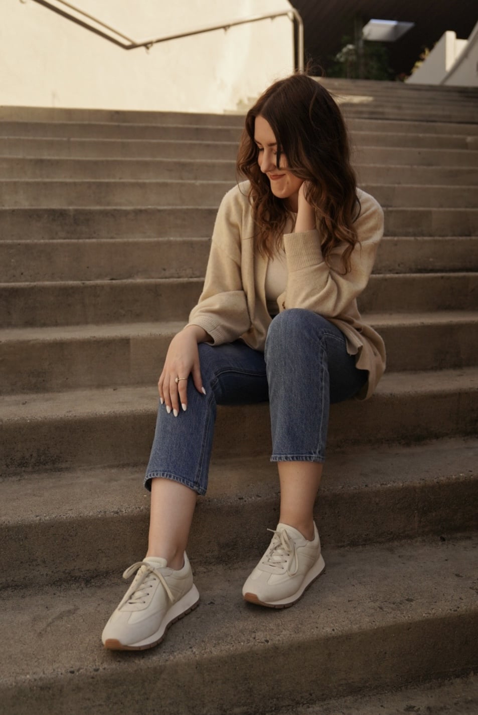 woman wearing Koio Retro Runner Sneakers in Cloud