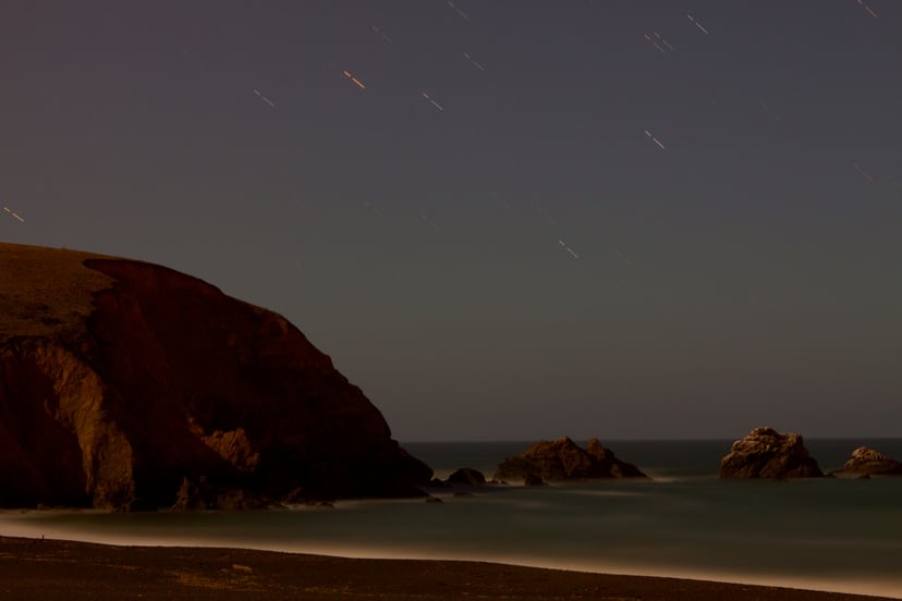 Star trails over the beach