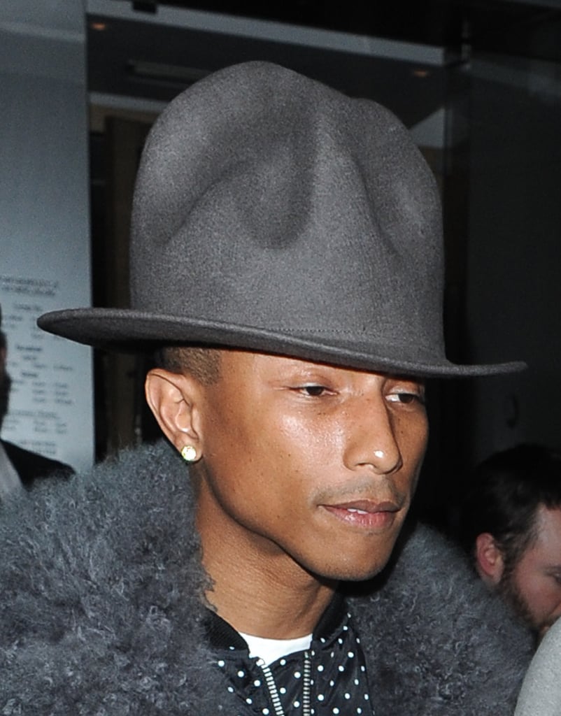 Pharrell was spotted out in London with his hat at the beginning of the month. The two switched up their look with matching shades of gray.