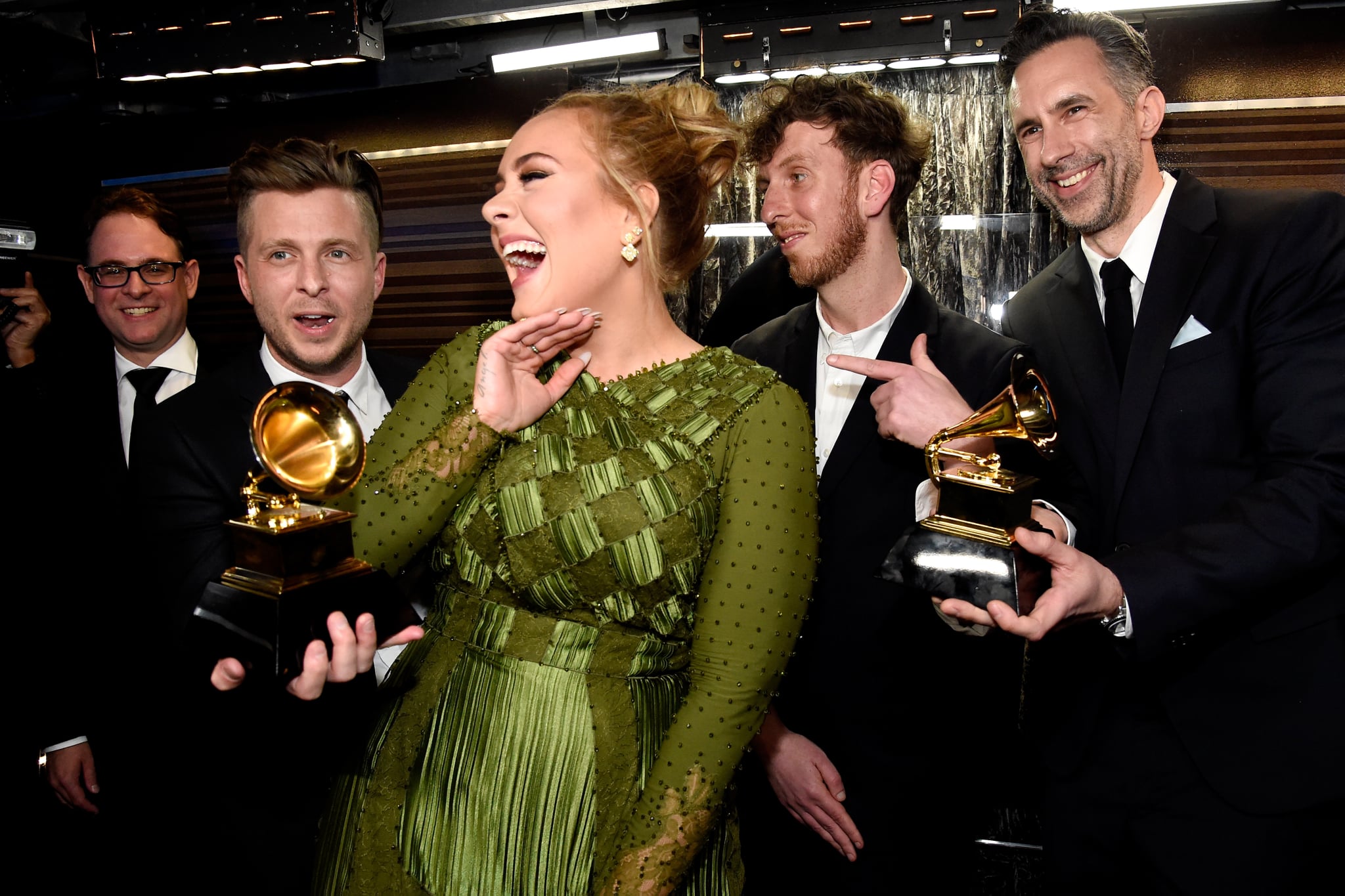Adele and her crew celebrated their album of the year win in 2017.