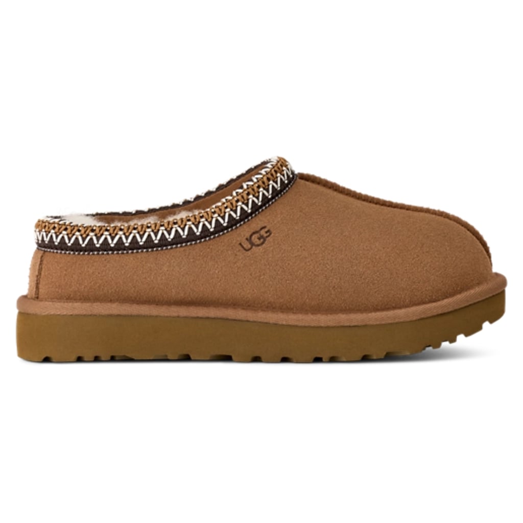 UGG Tasman II ($125)
No holiday gift guide feels complete without a UGG pick for adults. This pair is one just about everyone will love. They work indoors and out, with a plush sheepskin interior, a stylish braided collar, and a tractioned footbed for extra grip.
