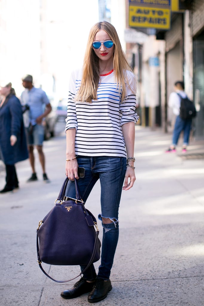 Don't overthink it — often the best rain gear is all your go-to pieces. You can't go wrong with skinny denim, a striped tee, and a pair of walkable brogues.