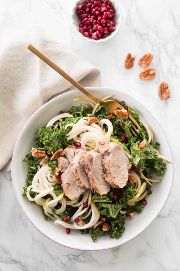 Pear Noodle, Pomegranate, and Kale Salad With Roasted Pork Tenderloin