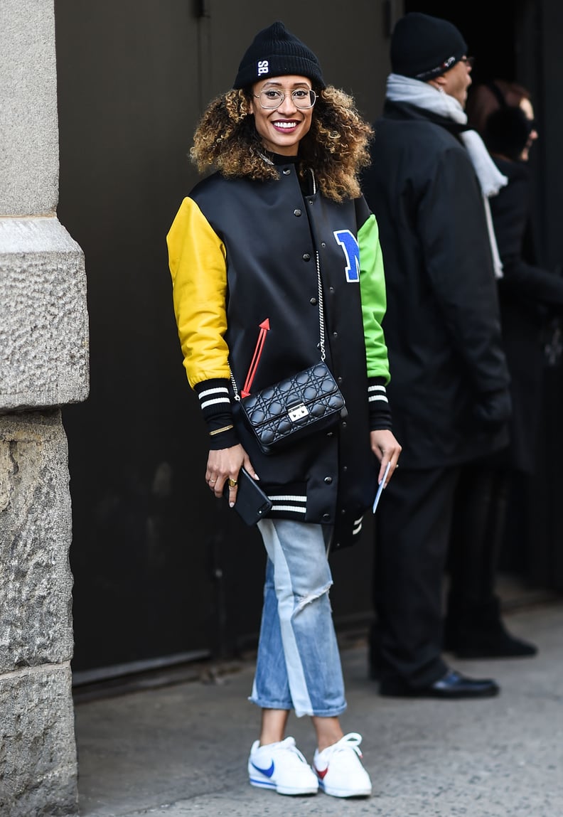 Wear a Colorful Bomber Jacket With a Beanie and Side-Striped Jeans