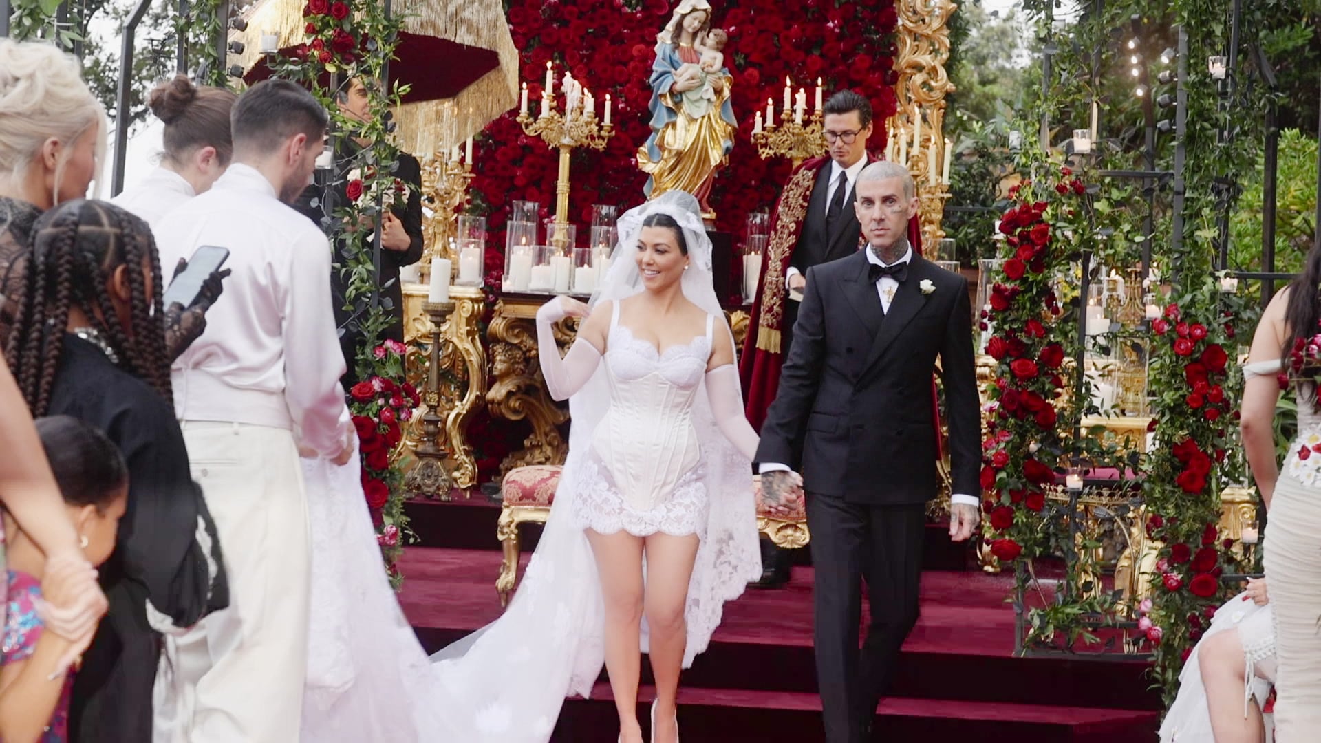 PLEASE NOTE: All images are embargoed until Thursday, April 13 at 12AM ET (April 12 at 9PM PT). 'Til Death Do Us Part Kourtney & Travis -- Kourtney, Travis, and their guests enjoy a luxurious wedding weekend in Portofino, Italy. Private and personal footage reveal an intimate family event full of beautiful moments. Kourtney Kardashian Barker and Travis Barker, shown. (Photo: Courtesy of Hulu)