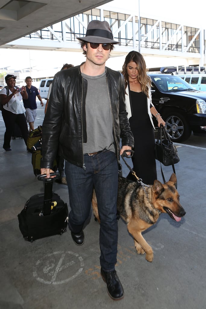 Ian Somerhalder and Nikki Reed arrived at LAX with a furry pal on Friday.