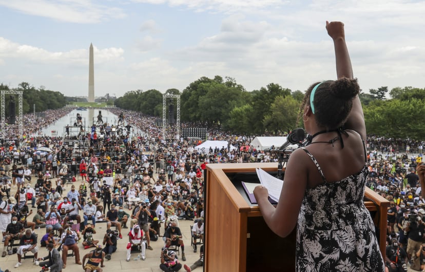 WASHINGTON, DC - AUGUST 28: 12-year-old Yolanda Renee King, the granddaughter of Rev. Martin Luther King Jr., thrusts her fist as she speaks to the 