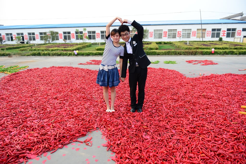 A couple got engaged in a sea of red peppers in China on Friday.