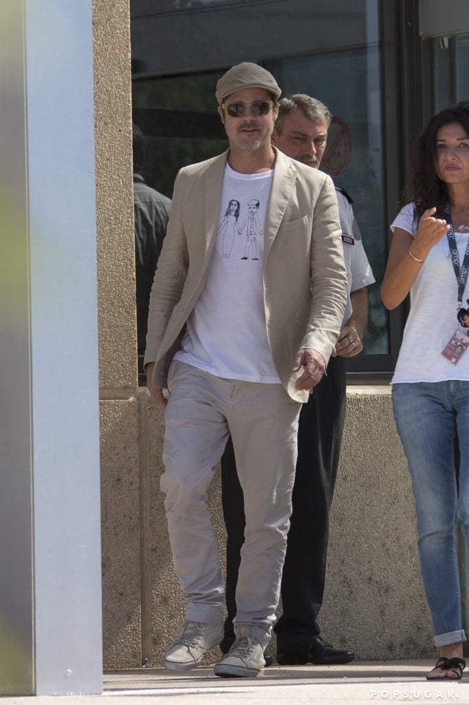 Brad Pitt Wears Homemade Shirt at Airport in France | Photos