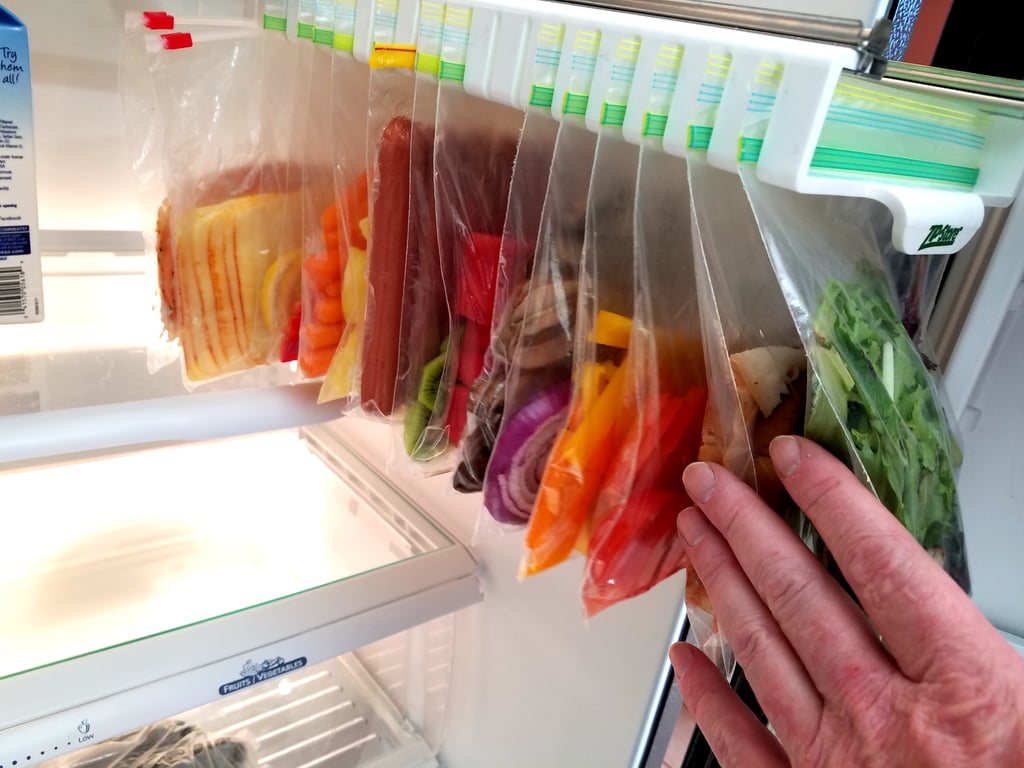 Prep baggies of grab-and-go snacks, then hang them in the Zip 'n' Store ($40). They'll be ready and waiting when hunger strikes for you — or your kids. (And bonus, they can grab them out of the fridge themselves!)