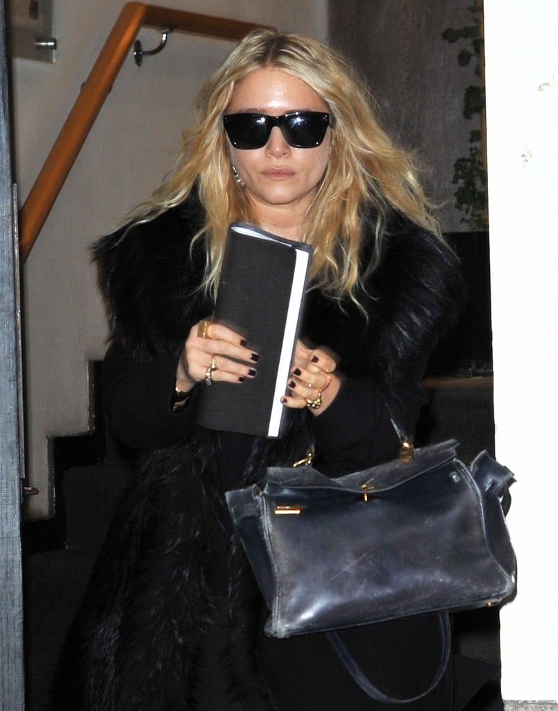 Mary-Kate accessorised with a pair in a furry coat in Soho in 2010.