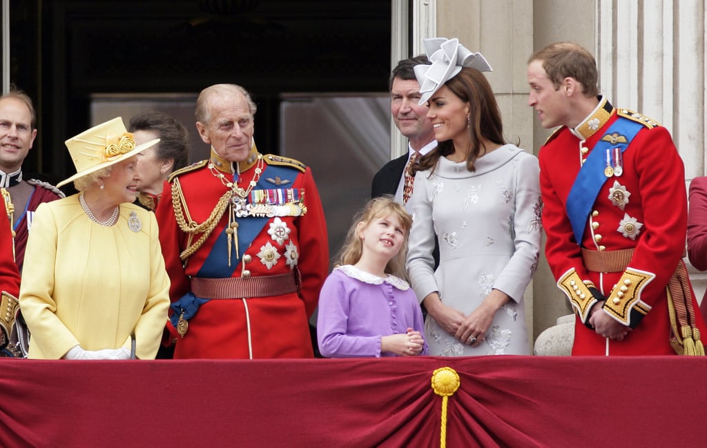 The queen enjoyed the Trooping the Colour parade in 2012 with granddaughter Lady Louise Windsor, grandson Prince William, and William's wife, Kate Middleton.