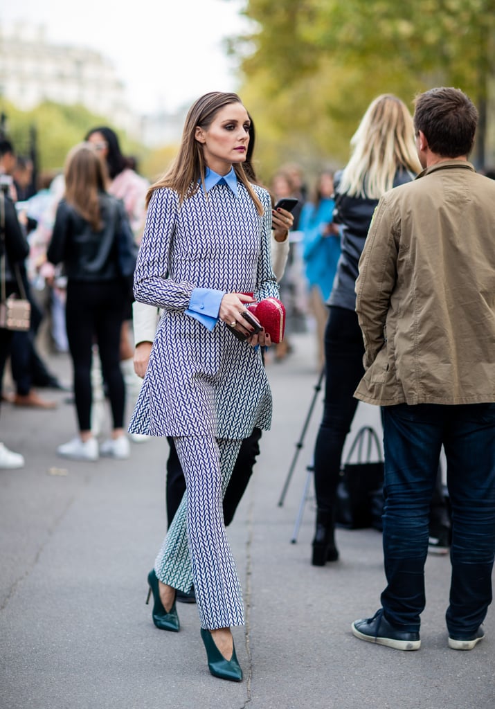 Olivia added interest to this matching set with a button-down layered underneath. Artful layering is a specialty of the style star's, and she put it to work throughout the week in Paris.