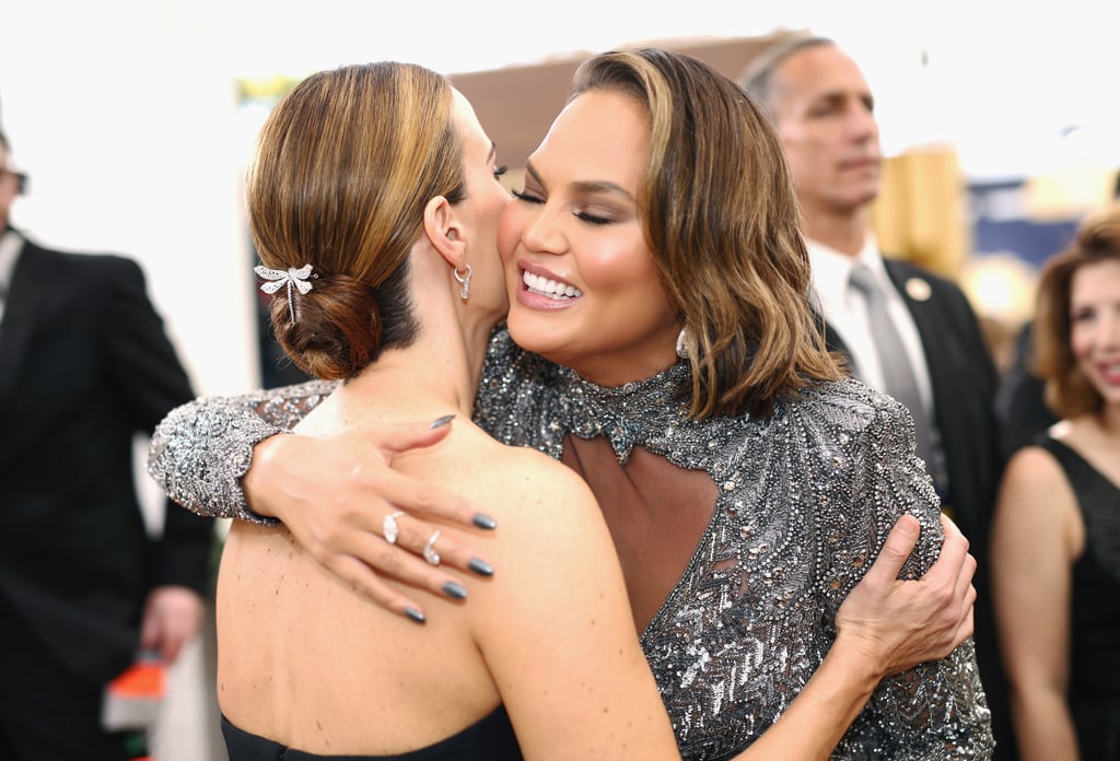 Pictured: Sarah Paulson and Chrissy Teigen
