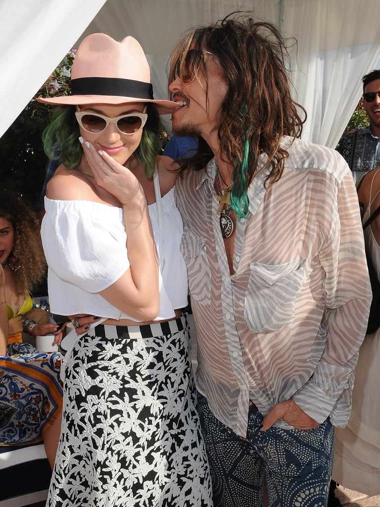 Steven Tyler bit Katy Perry's hat at the Lacoste party.