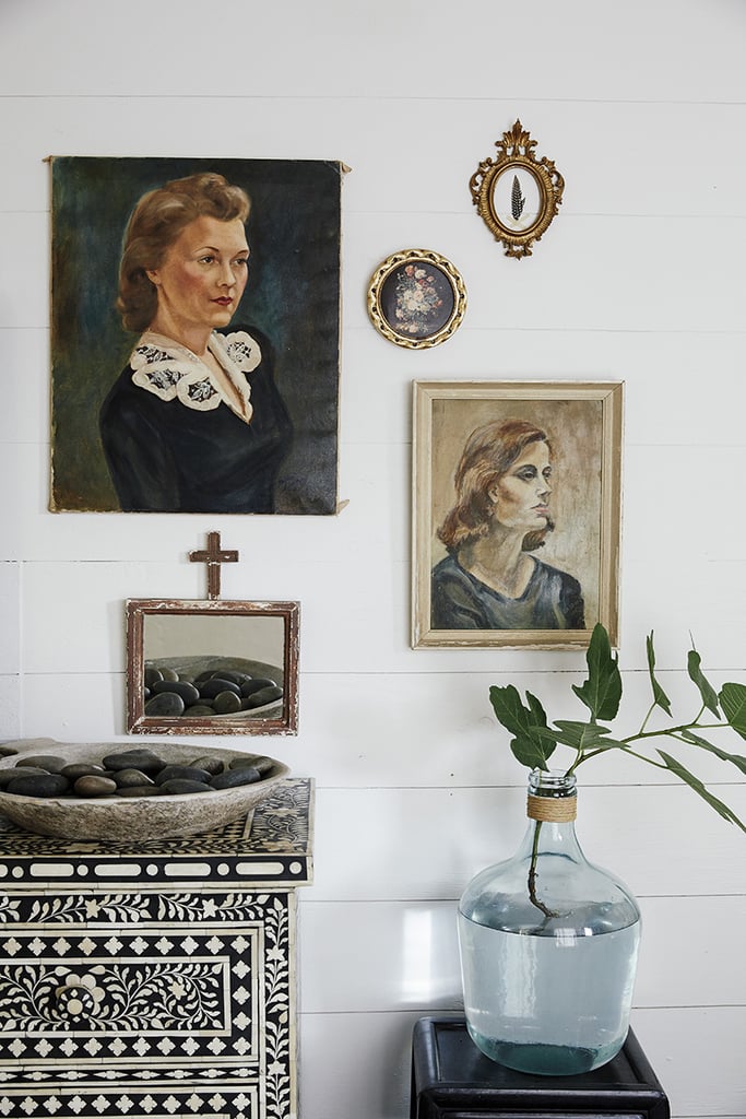 Paige mixed smaller frames and accessories with traditional paintings for an eclectic gallery wall.
Source: Cody Ulrich via Homepolish