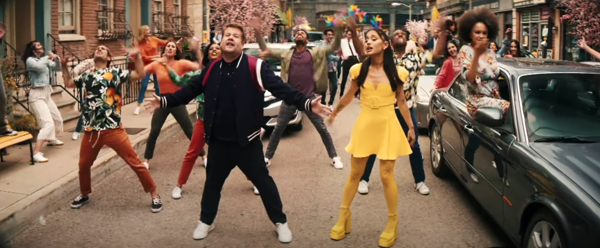 The Versace yellow ensemble with short dress, tights, platform sandals worn  by Ariana Grande in the clip No Lockdowns Anymore w / Ariana Grande &  Marissa Jaret Winokur