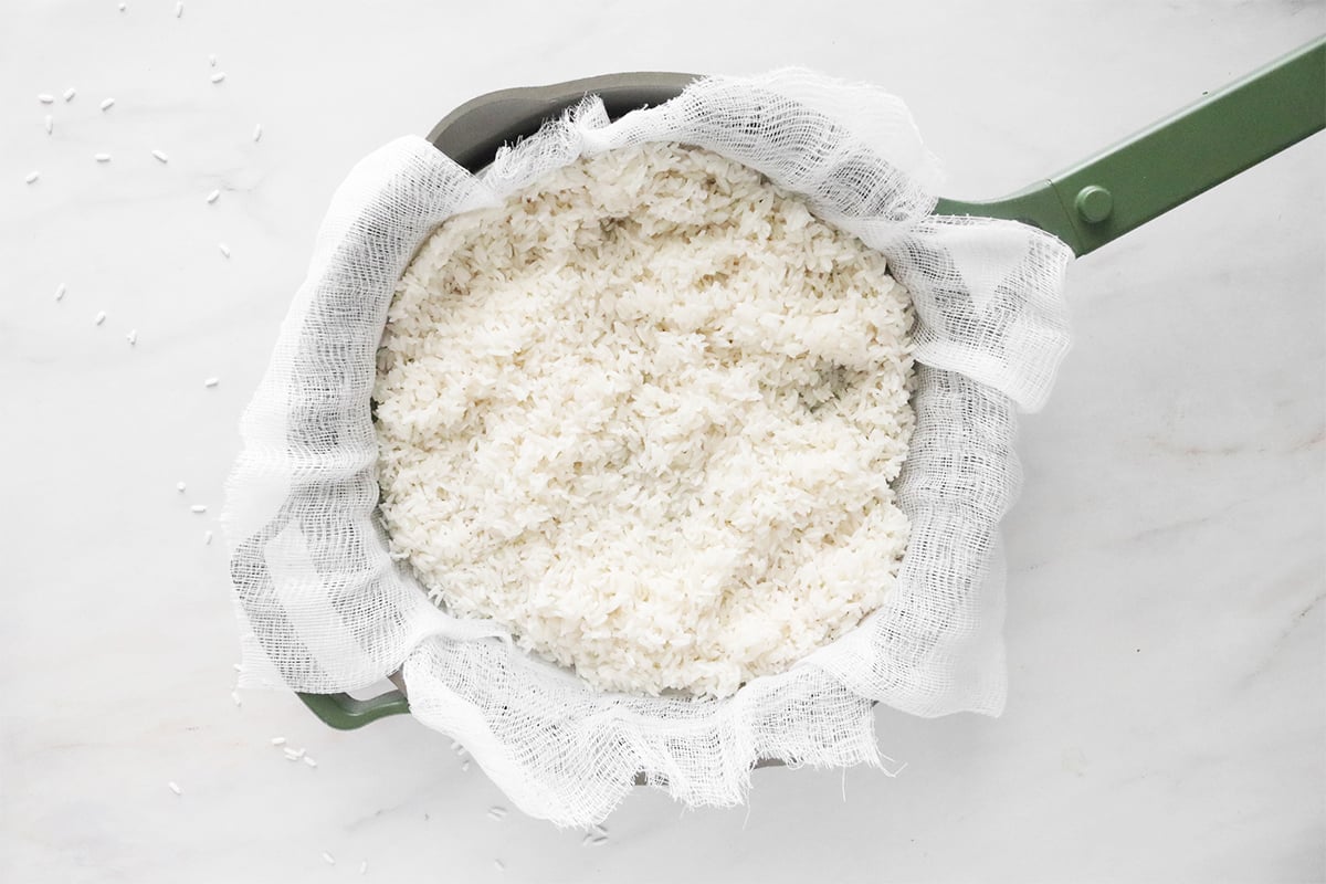 Add soaked rice to steamer basket