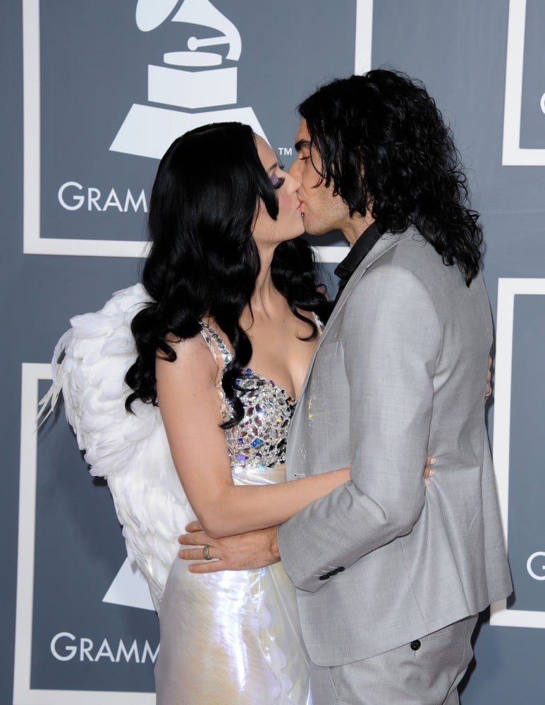 Katy Perry got a good-luck peck from her then-husband Russell Brand at the Grammys in February 2011. Katy Perry got a good-luck peck from her then-husband Russell Brand at the Grammys in February 2011.
