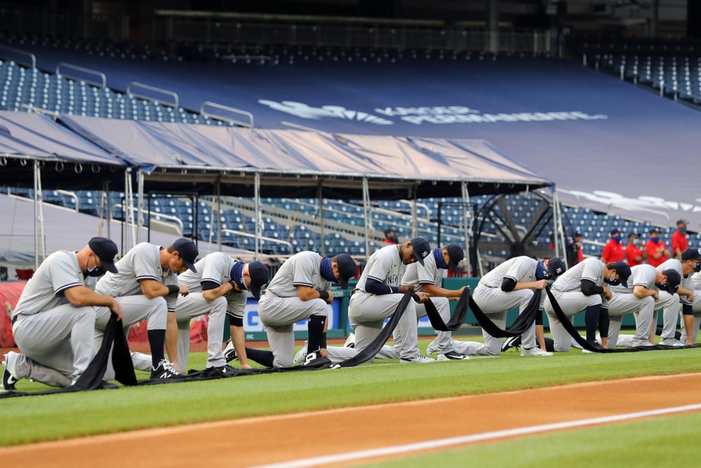 See MLB Players Kneel For Racial Justice on Opening Day