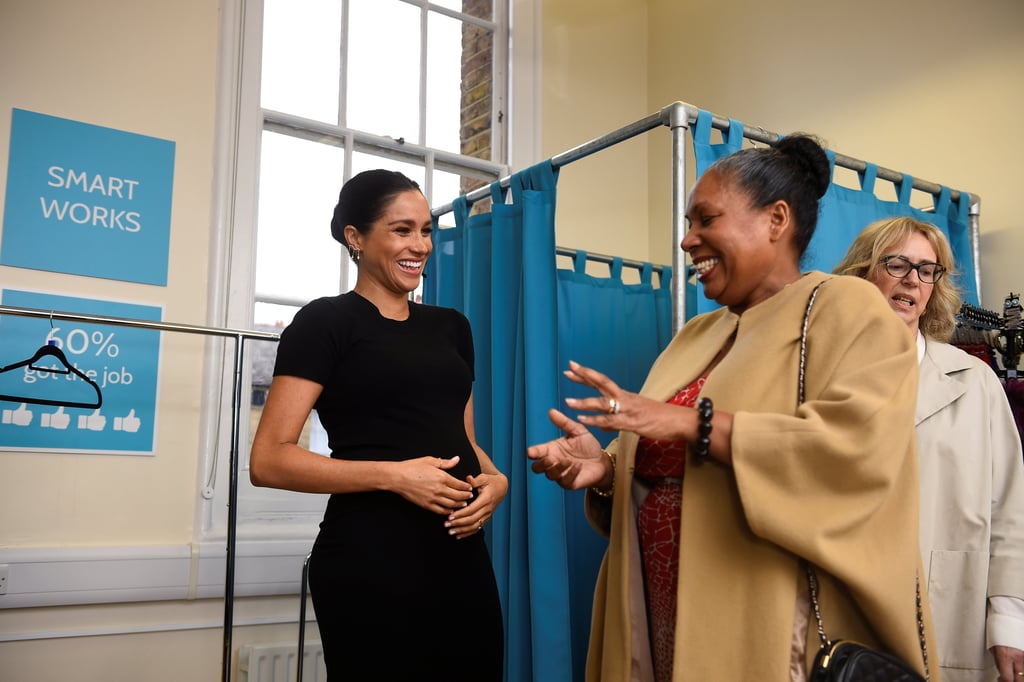 Meghan Markle Touching Baby Bump Pictures