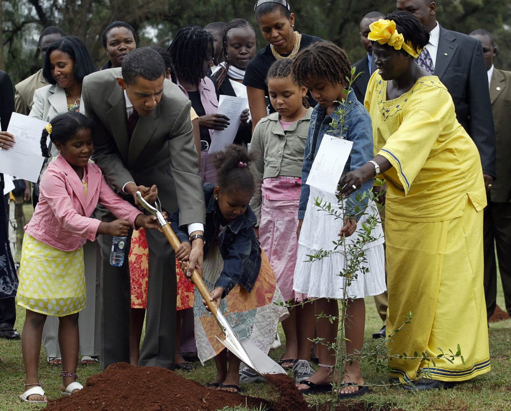 Planting a tree with his family and Nobel Prize winner Wangari Maathai while visiting Kenya in 2006
