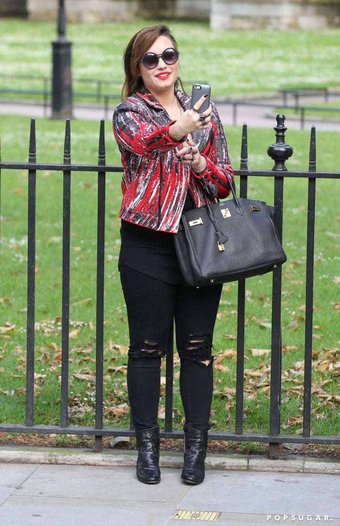 Demi Lovato took a selfie in front of the Houses of Parliament in London in May 2014.