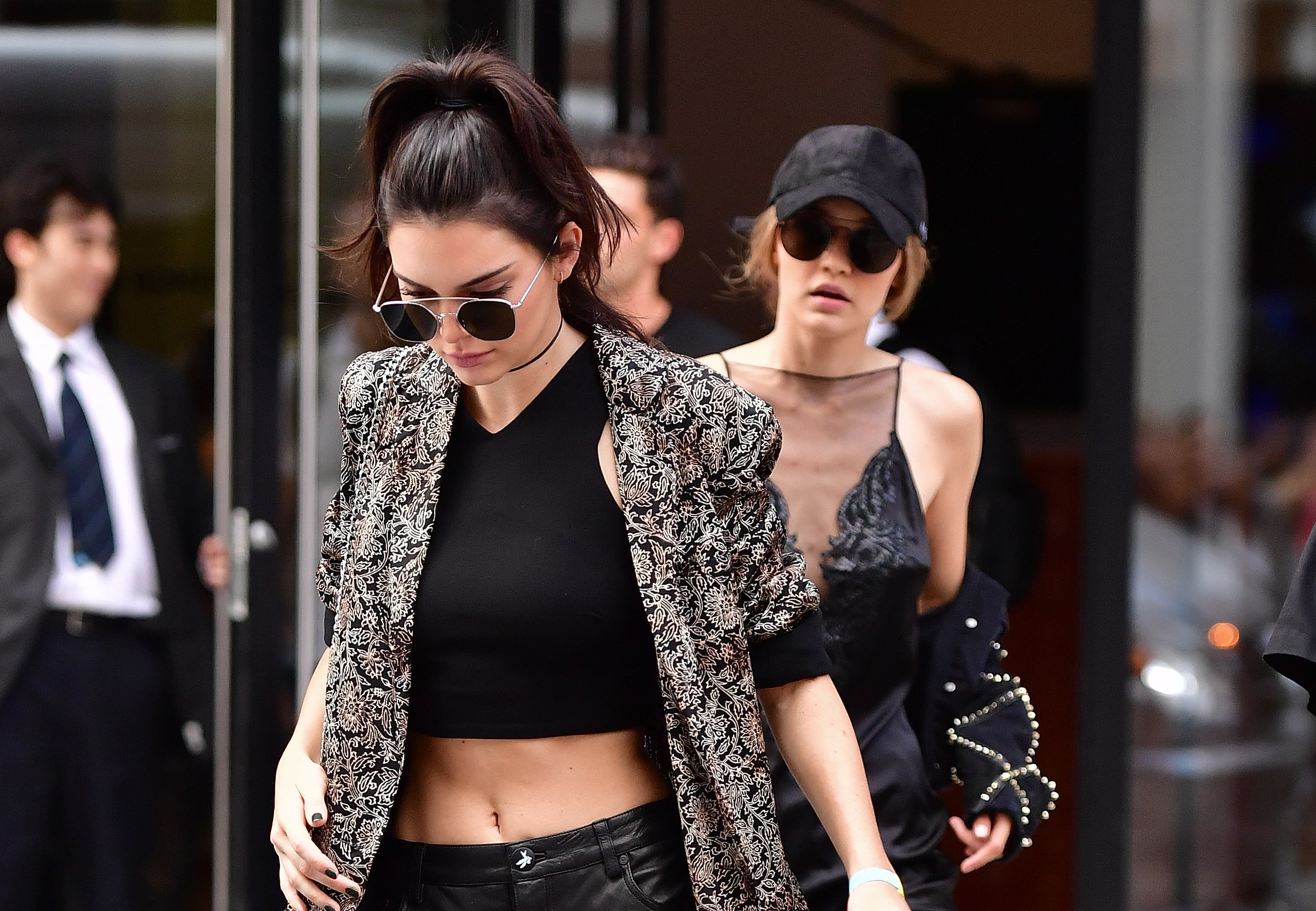 Kylie Jenner rocks the 90s while Kendall shows off her toned